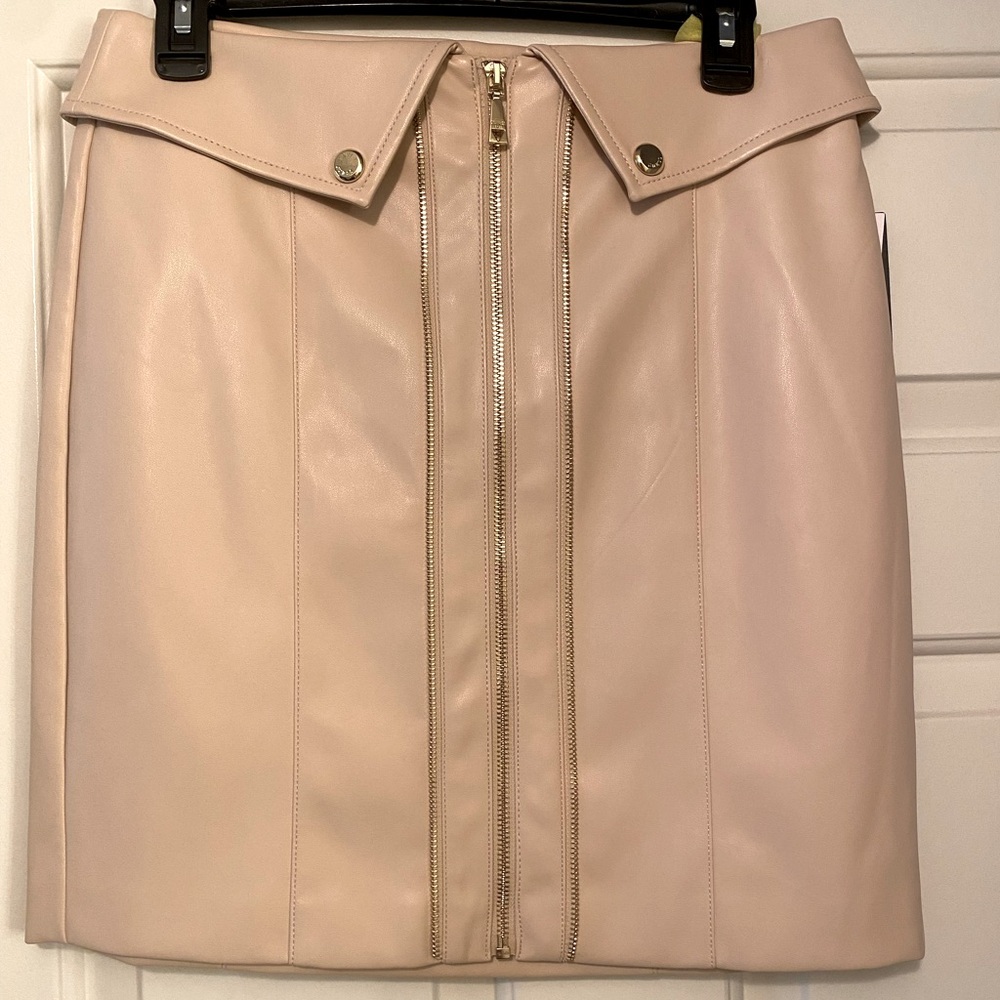Guess Faux leather skirt with gold details.